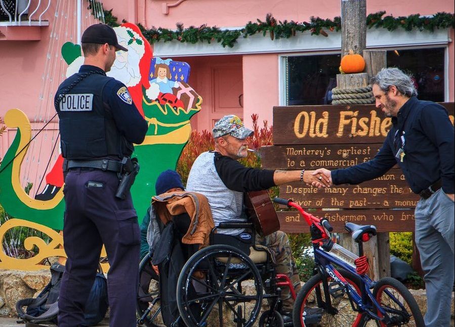 Picture of cops helping person