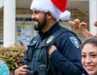 Picture of cop in a santa hat